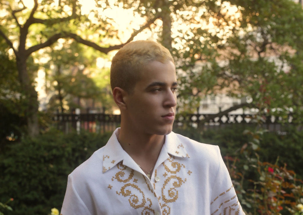 model wearing cross stitch shirt