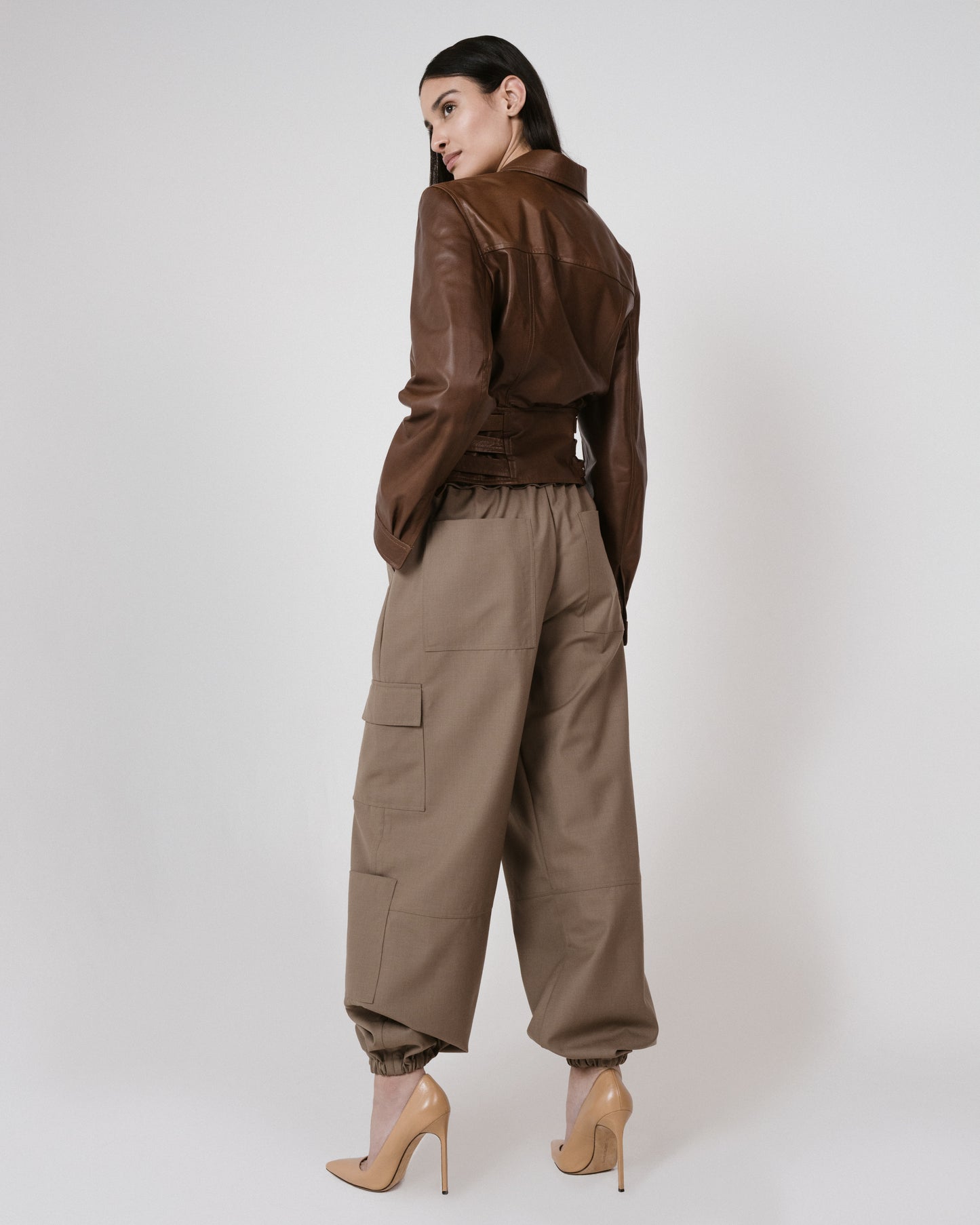 brown pants leather jacket back
