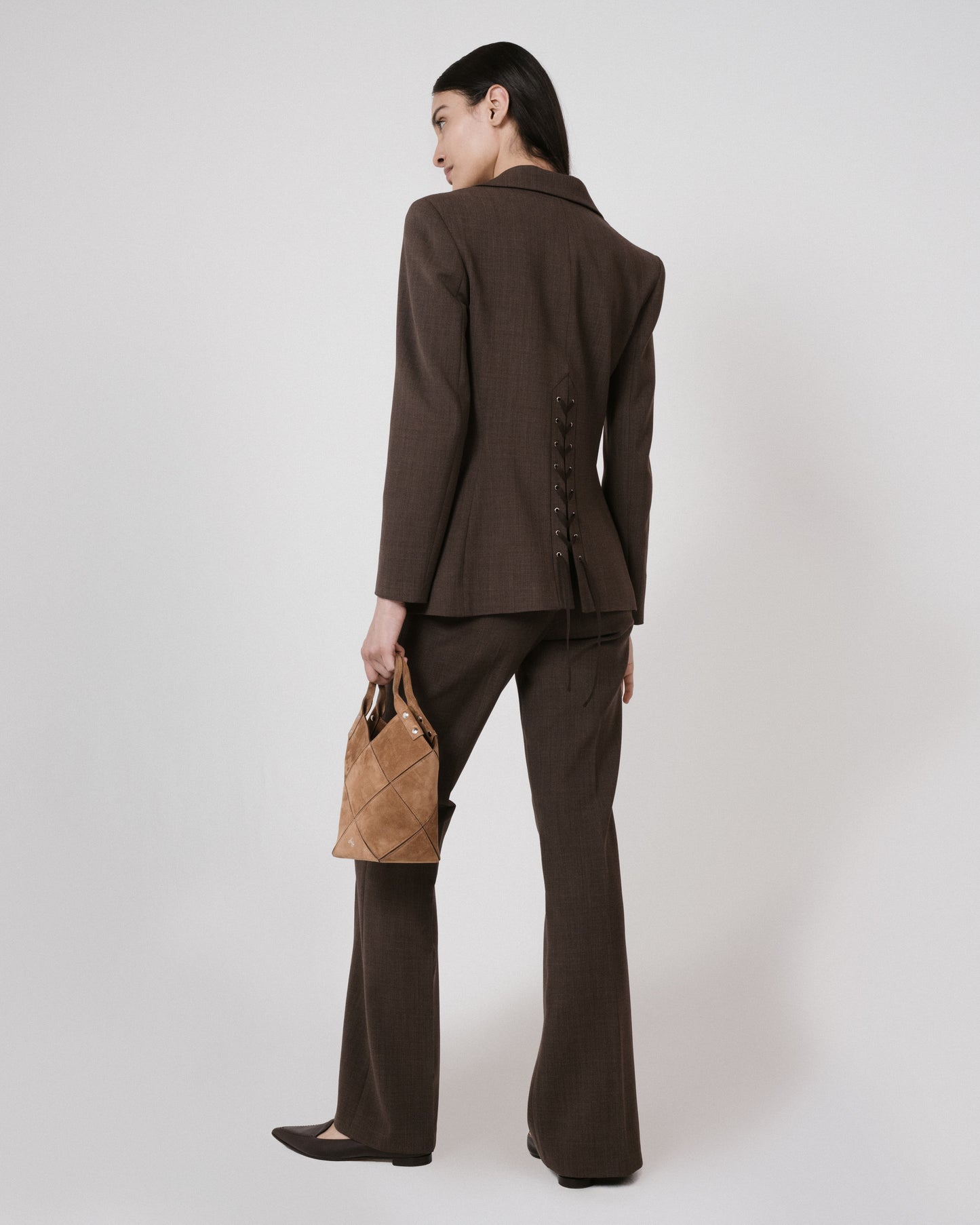 brown suit caramel bag back view