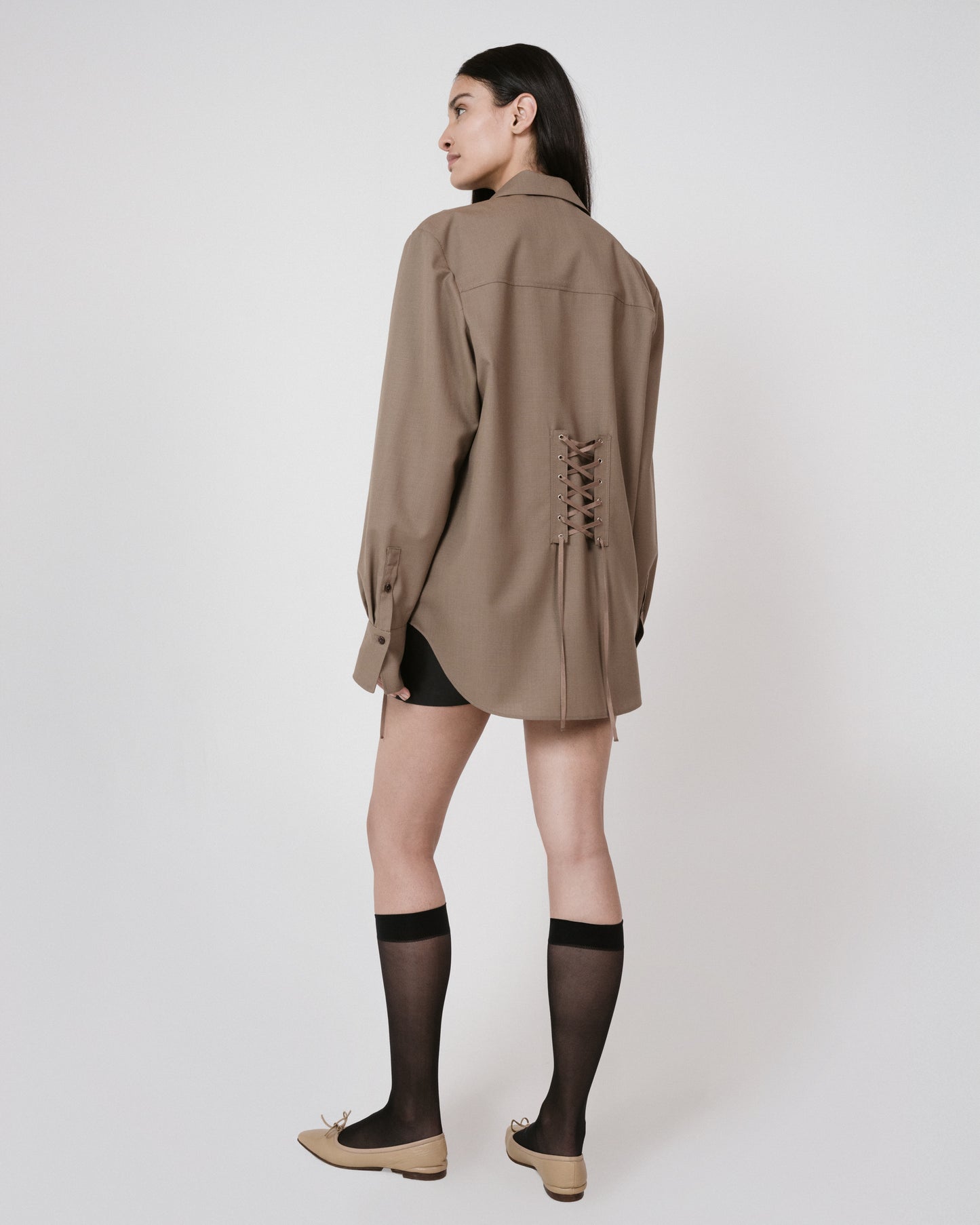 brown lace up shirt back view