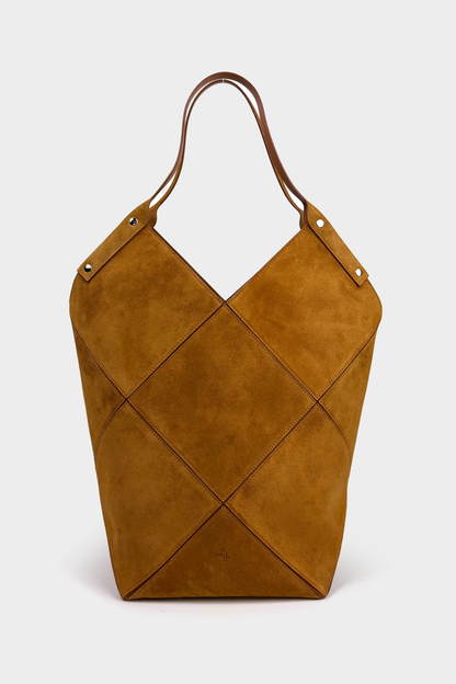 Brown leather tote bag with criss-cross pattern on a white background