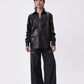black leather shirt with zip cargo pants