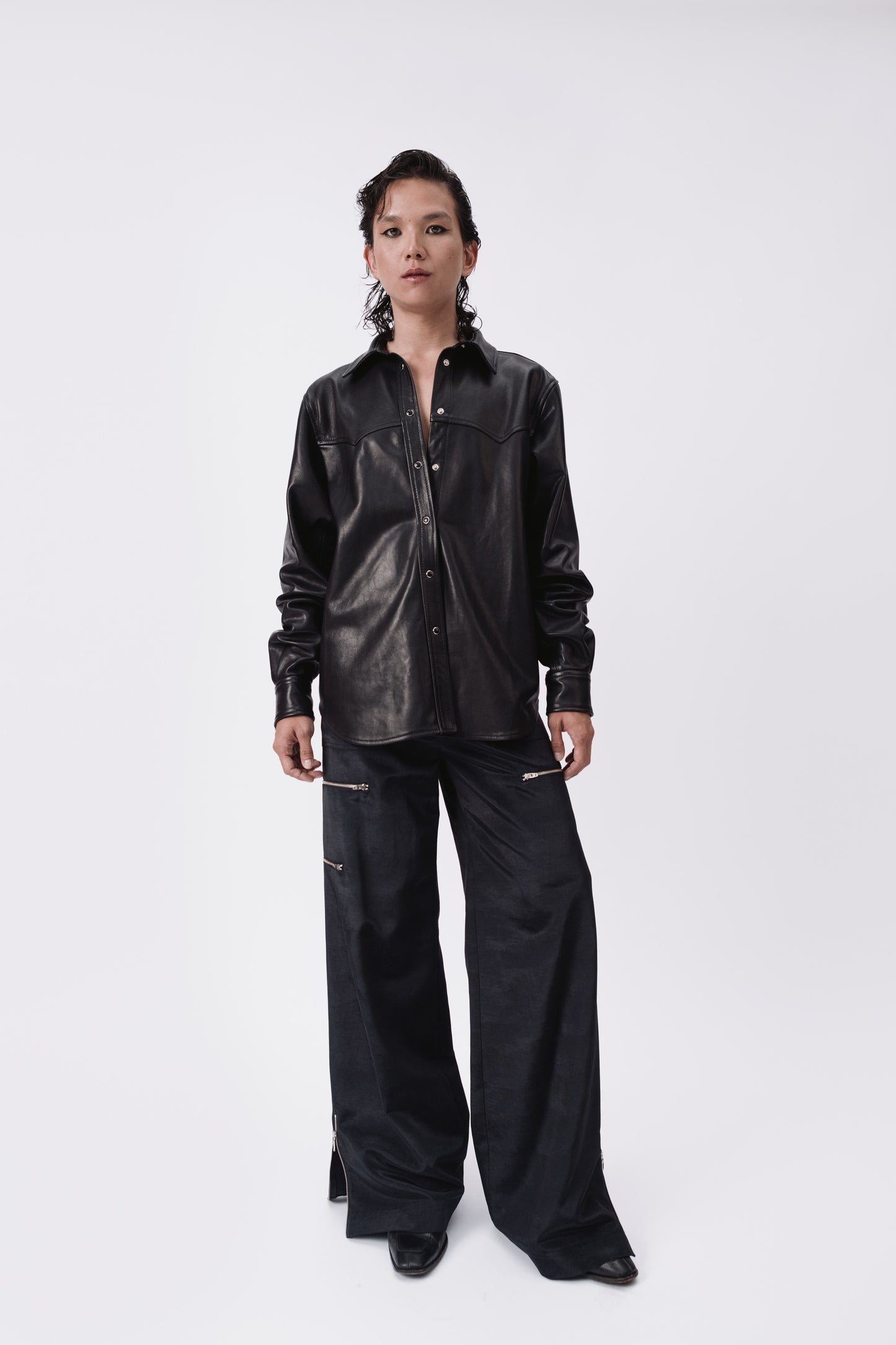 black leather shirt with zip cargo pants