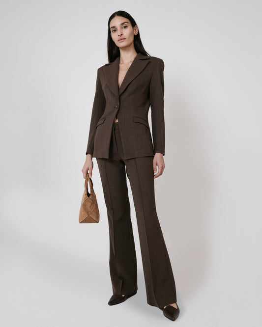 brown suit caramel bag