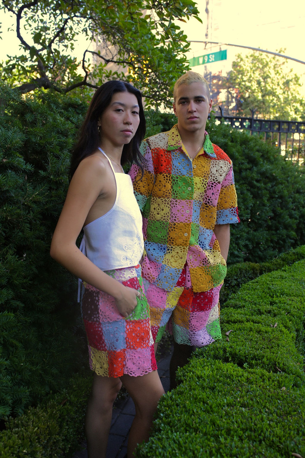 models wear rainbow crochet button down shorts