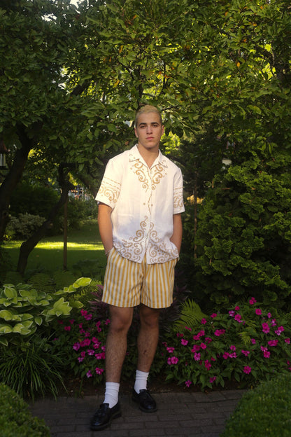 model wears button down shirt with embroidery
