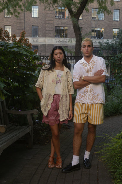 models wear crochet and button down shirt with embroidery